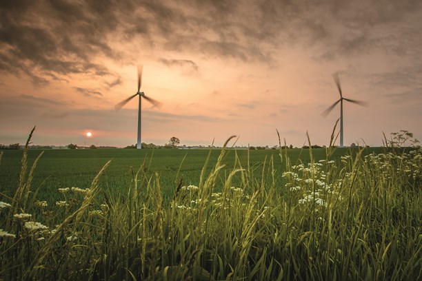 Windräder mit Sonnenaufgang Windräder mit Sonnenaufgang